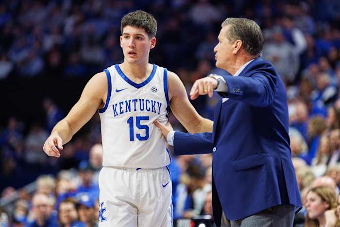 Jan 31, 2024; Lexington, Kentucky, USA; Kentucky Wildcats guard Reed Sheppard (15) talks with head coach John Calipari during the first half against the Florida Gators at Rupp Arena at Central Bank Center. Mandatory Credit: Jordan Prather-USA TODAY Sports